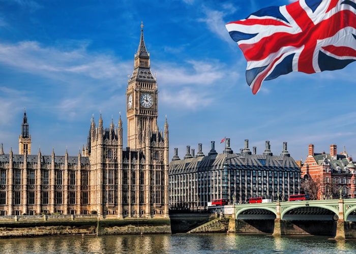 Big Ben With Flag Of United Kingdom In London, Uk